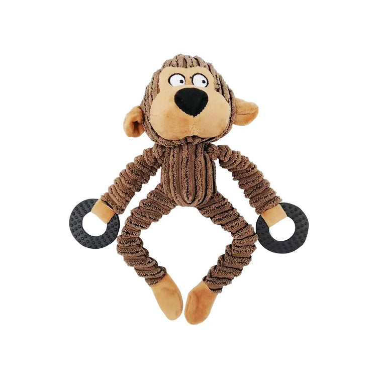 Plush monkey toy with black rings on a white background