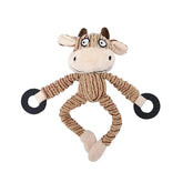 Plush toy cow with black wheels on a white background